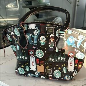 Halloween themed purse.  Man made materials.  Based on the Haunted Mansion.